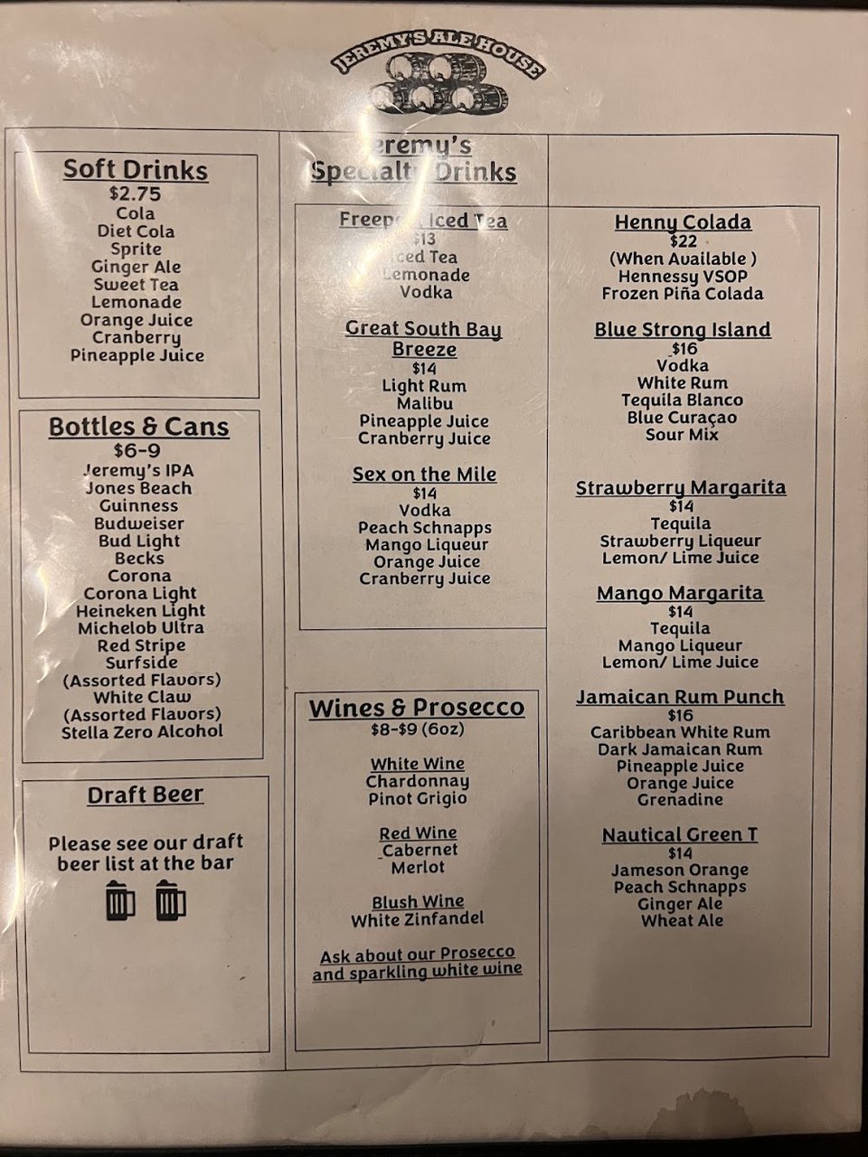 Menu board with seafood starters and wings.